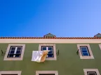 Looking up in Lisbon - clothes decorating apartments thumbnail
